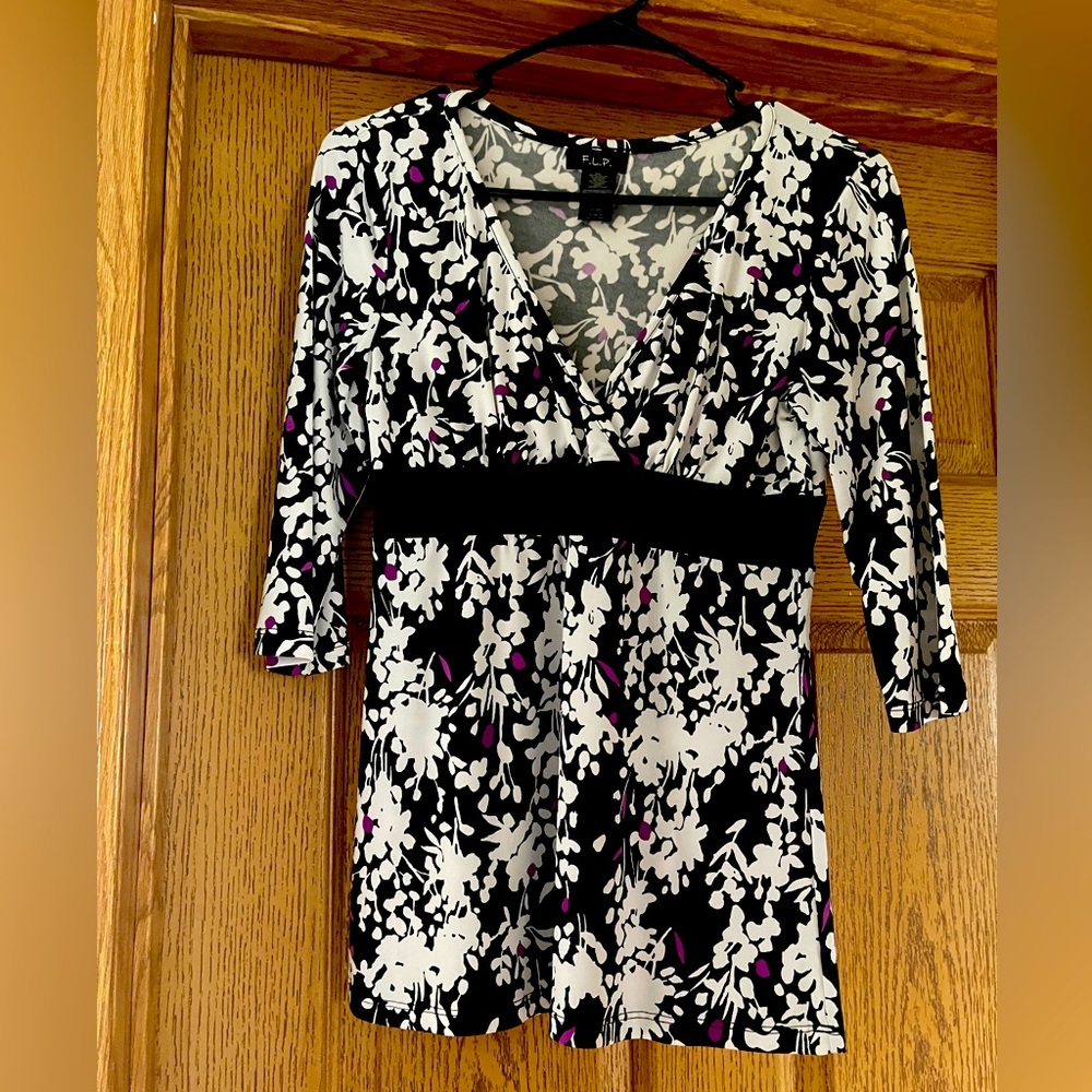 black white and purple blouse. looks great with black dress pants...